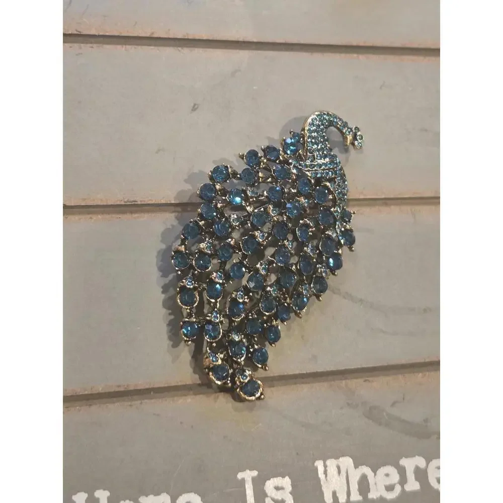 Blue green rhinestone jeweled peacock brooch